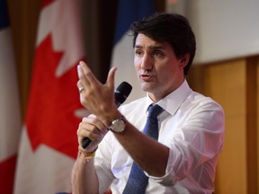 Prime Minister Justin Trudeau takes part in a question and answer session with students at Sciences Po in Paris, France on Monday, April 16, 2018.