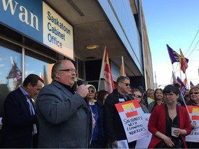 Saskatchewan Government and General Employees Union President Bob Bymoen addresses a rally outside the provincial government's Saskatoon cabinet office on Friday, April 20, 2018. Saskatoon StarPhoenix photo by Alex MacPherson.