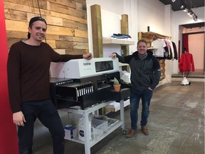 Blair Therrien (left) and Mac Maclean inside Uno Printing Co.'s new shop on 2nd Avenue North in Saskatoon on April 19, 2018. (Erin Petrow/ Saskatoon StarPhoenix)