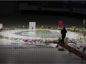 Flowers line the ice surface at Elgar Petersen Arena, one of the earliest in a series of gestures to honour the Humboldt Broncos after the tragic crash that claimed the lives of 16.