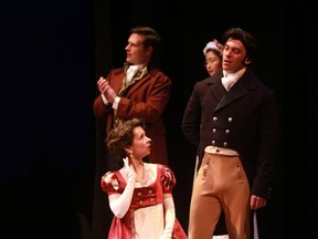 Jamie Lee Shebelski, left, and Aaron Hursh perform a scene from Pride and Prejudice during a media call at Persephone Theatre in Saskatoon, Sask. on May 1, 2018.