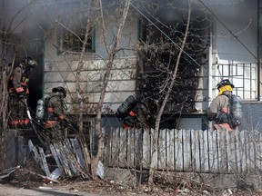 Five police officers who inhaled smoke while rescuing a man from a flaming house on Avenue L south have been released from hospital.