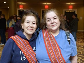 Sisters Glenda Burley (left) and Joanne Munroe (right), Sixties Scoop survivors, flew in to Saskatoon from New Brunswick to attend the hearings regarding the federal government's settlement offer of $800 million.