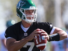 Riders quarterback Zach Collaros, above, is pleased to be teammates with defensive end Charleston Hughes.
