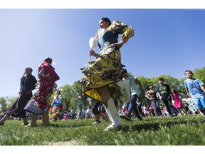 Chanelle Gamble dances during the Graduation Powwow held in the bowl of the University of Saskatchewan in Saskatoon, SK on Wednesday, May 31, 2017.