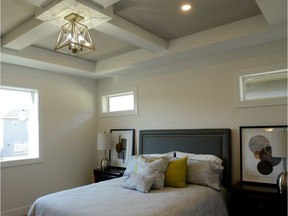 In addition to boasting tons of room, the master bedroom at 142 Boykowich Bend also features a gorgeous tray ceiling, upgraded light fixture, and large walk-in closet with custom built-in shelves and rods. (Jennifer Jacoby-Smith/The StarPhoenix)