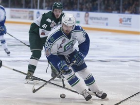 Swift Current Broncos captain Glenn Gawdin stickhandles into the Everett Silvertips' zone during Game 2 of the WHL final on Saturday. Photo courtesy Robert Murray/WHL.