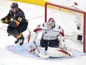 Braden Holtby #70 of the Washington Capitals tends net as Reilly Smith #19 of the Vegas Golden Knights jumps out of the way of a shot during the third period in Game Two of the 2018 NHL Stanley Cup Final at T-Mobile Arena on May 30, 2018 in Las Vegas, Nevada.