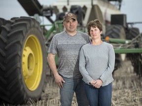 Russell Herold and his wife Raelene are shown on the family farm near Montmartre.