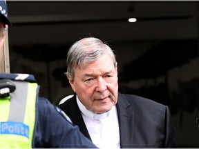 The Vatican's finance chief Cardinal George Pell leaves Melbourne's County Court in Melbourne on May 2, 2018.  Top Pope aide Pell could face two separate trials as he fights to clear his name over historic sexual offences, an Australian court heard.