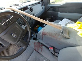 RCMP are investigating after an axe went through the windshield of a truck on Highway 16 near Plunkett earlier in May.