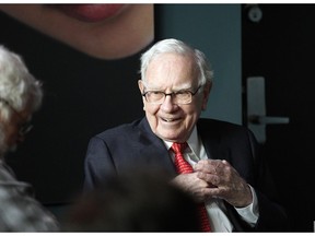 Warren Buffett, chairman and CEO of Berkshire Hathaway, smiles while playing bridge outside Berkshire-owned Borsheims jewelry store in Omaha, Neb., Sunday, May 6, 2018. On Saturday, tens of thousands of Berkshire Hathaway shareholders attended the annual Berkshire Hathaway shareholders meeting.