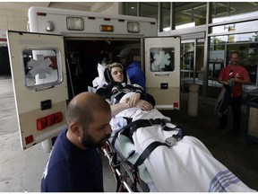 Ryan Straschnitzki is wheeled on a stretcher into Shriners Hospitals for Children, Thursday May 31, 2018 in Philadelphia.