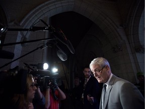 Transport Minister Marc Garneau speaks with reporters in Ottawa on Thursday, May 10, 2018.