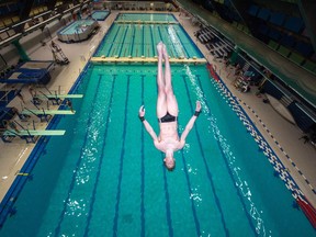 The Regina Diving Club's Bjorn Markentin leaps off the highest diving platform during a practice at the Lawson Aquatic Centre.