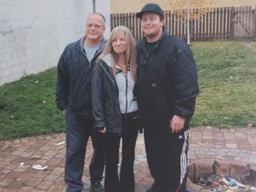 Tyler Applegate (R) who was fatally shot in July 2017 is pictured in an old family album in Saskatoon, SK on Tuesday, May 15, 2018.