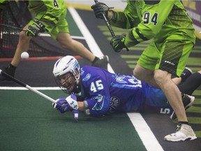 Rochester Knighthawks defender Luc Magnan falls to the ground during Game 1 of the National Lacrosse League's Champions Cup final at SaskTel Centre in Saskatoon on Saturday, May 26, 2018.