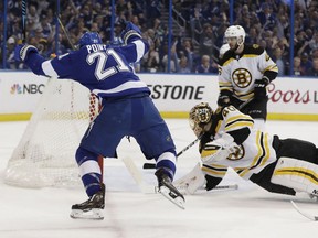 Tampa Bay Lightning center Brayden Point (21) celebrates after scoring past Boston Bruins goaltender Tuukka Rask (40) during the second period of Game 5 of an NHL second-round hockey playoff series Sunday, May 6, 2018, in Tampa, Fla.