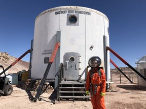 FOR YOUNG INNOVATORS -- University of Saskatchewan graduate student Doug Campbell, who dreams of a career in space, is currently on a "space mission" to Mars, simulated deep in the Utah desert. His two-week mission simulation at the Mars Desert Research Station ranges from growing his own food to doing outdoor explorations in a spacesuit.  As part of the training,  he has developed and is testing a waterless dishwasher that may help one day make astronauts' lives easier when space travelling. (Photo by Shawna Pandya for the Saskatoon StarPhoenix)