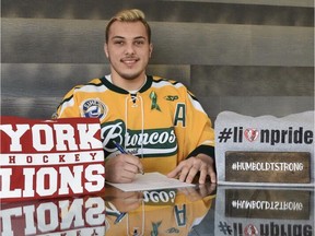 Humboldt Broncos' forward Kaleb Dahlgren signs a letter of intent to play hockey with the York University Lions.
