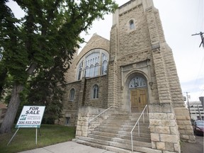 A for sale sign is seen in front of the Third Avenue United Church in Saskatoon, SK on Friday, June 9, 2017.