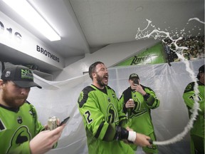 Saskatchewan Rush forward Mark Matthews sprays champagne after winning the NLL championship at SaskTel Centre in Saskatoon on Saturday, June 9, 2018.