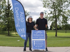 Lindsay Quick, left, and Piotr Sztorc, owners of YXE Quick Clean, a mobile auto detailer, stand for a photograph at their temporary location at the Willows Golf Course in Saskatoon, SK on Monday, June 11, 2018.