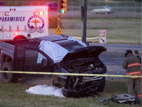Saskatoon Police, Fire and M.D. Ambulance at the scene of a crash at the corner of Airport Drive and Circle Drive after a police pursuit in Saskatoon, SK on Monday, June 19, 2017. A 22-year-old man died in the crash and a police officer was briefly hospitalized with neck and hip injuries. The chase involved a stolen truck. (Saskatoon StarPhoenix/Liam Richards)