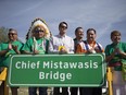 FSIN Vice-Chief David Pratt, Saskatoon Tribal Council Chief Mark Arcand, Saskatoon Mayor Charlie Clark, Neal Kewistep, Gilbert Kewistep and Shirley Isbister reveal the new name for the North Commuter Bridge — Chief Mistawasis Bridge — during the National Indigenous Peoples Day event at Victoria Park  in Saskatoon on Thursday, June 21, 2018.