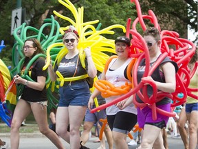 SASKATOON,SK--JUNE 23 0624-NEWS-PRIDE PARADE-Attendants march down the street  during the Saskatoon Pride Parade held downtown in Saskatoon, SK on Saturday, June 23, 2018.