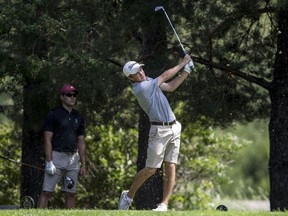 Roman Timmerman tees off at the 12th hole during the City menÕs championship at Riverside country club in Saskatoon, SK on Monday, June 25, 2018.