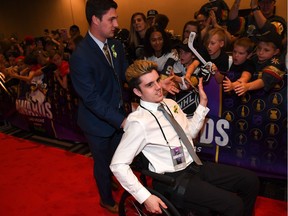 Ryan Straschnitzki of the Humboldt Broncos greets fans as he arrives to the 2018 NHL Awards on June 20, 2018 in Las Vegas, Nevada.