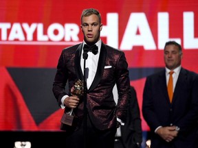 Taylor Hall of the New Jersey Devils accepts the Hart Trophy given to the most valuable player to his team onstage at the 2018 NHL Awards presented by Hulu at The Joint inside the Hard Rock Hotel & Casino on June 20, 2018 in Las Vegas, Nevada.