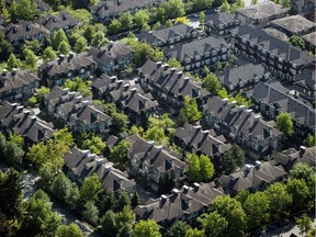 B.C. has joined jurisdictions throughout the world in limiting the real-estate purchasing power of foreign nationals. But a young woman's lawsuit claims the foreign-buyers tax is illegal. (Photo: A neighbourhood of townhouses in Richmond.)