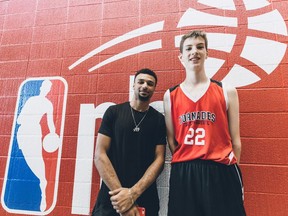 Denver Nuggets guard Jamal Murray, left, poses for a photo with Olivier Rioux, 12, in St. Catharines, Ont., in this recent handout photo. A grinning Denver Nuggets guard Jamal Murray posed for a selfie at last weekend's regional finals for the Jr. NBA world championship in St. Catharines, Ont., with a 12-year-old boy. Murray requested the selfie, not the other way around. Why? Because standing a sky-high six-foot-10, Olivier Rioux towers over the Canadian NBA player by seven inches.