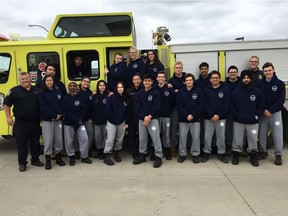 Nineteen high school students from across Saskatoon have completed an eight-week course to become fire cadets with the city's fire department. (Supplied)