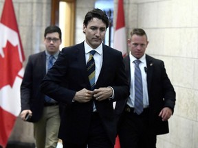 Prime Minister Justin Trudeau leaves his office on Parliament Hill after meeting with the Canadian Steel Producers Association, in Ottawa on Monday, June 4, 2018.