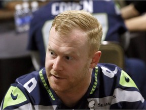 Seattle Seahawks punter Jon Ryan answers a question at a news conference in advance of the 2015 Super Bowl.