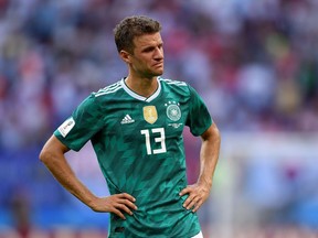 German striker Thomas Muller of Germany looks dejected following his team's 2-0 defeat to South Korea and subsequent elimination from the World Cup on June 27.