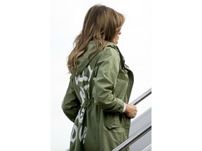 First lady Melania Trump boards a plane at Andrews Air Force Base, Md., Thursday, June 21, 2018, to travel to Texas.