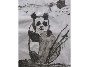 Panda by Hai T., Grade Four from St. Kateri Tekakwitha School is in display at Market Mall Children's Playland Art Gallery.