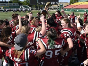 The Regina Riot celebrate a 2017 Western Women's Canadian Football League victory over the visiting Saskatoon Valkyries. The provincial rivals are to meet Sunday, 3 p.m., at Mosaic Stadium in the league final.