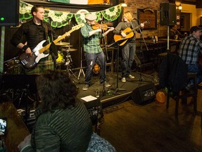 A Dram Too Few entertains the crowd celebrating St. Patrick's Day at Fionn MacCool's in Saskatoon, SK on Friday, March 17, 2017.