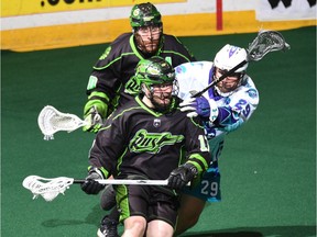 Saskatchewan Rush forward Robert Church is pursued by the Rochester Knighthawks' Ian Llord during Game 2 of their NLL final Saturday night in Rochester, N.Y. (Micheline Veluvolu/Rochester Knighthawks)