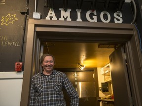 Amigos owner Steve Benesh stands for a photographer in entrance to the kitchen of the restaurant /music venue in Saskatoon, SK on Wednesday, April 11, 2018.