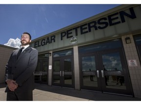 Humboldt Broncos' new head coach and GM Nathan Oystrick stands outside Elgar Petersen Arena Tuesday.