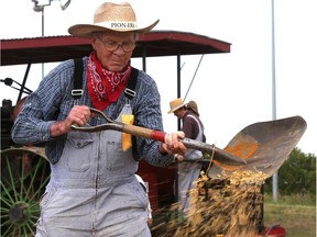 Western Development Museum volunteers share the story of threshing through harvest demonstrations during Pion-Era at the Western Development Museum in Saskatoon on July 8, 2017. The museum annouced this year's Pion-Era will be cancelled due to a multi-million dollar renovation at the museum.