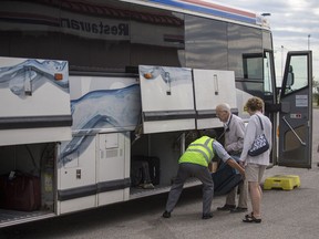 A Greyhound bus leave the Marquis Drive Husky truck stop in Saskatoon, SK on Monday, July 9, 2018. Greyhound has announced it will be ending bus service in western Canada later this year.