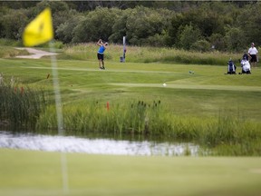 Brooklin Fry tees off during the provincial junior women's golf championship at Moon Lake Golf and Country Club on Monday, July 9, 2018.