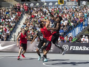 Team Saskatoon player Michael Lieffers takes a shot against Team Montreal player Alex Johnson during the FIBA 3x3 World Tour Saskatoon Masters in Saskatoon on Saturday, July 21, 2018.